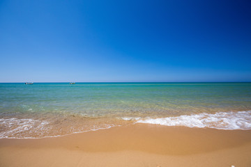 Fototapeta na wymiar Turquoise crystal clear water. Long sandy beach between Eraclea Minoa and Torre Salsa, Sicily, Italy