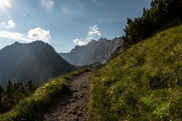 Hiking in the morning hours in the mountains of Austria