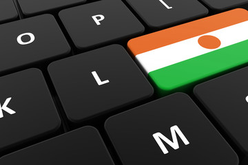 Computer keyboard, close-up button of the flag of Niger. 3D render of a laptop keyboard