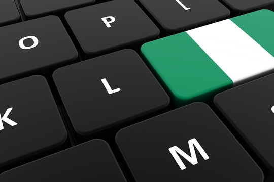 Computer keyboard, close-up button of the flag of Nigeria. 3D render of a laptop keyboard