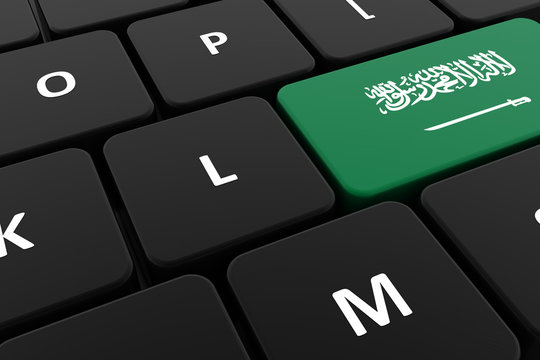 Computer keyboard, close-up button of the flag of Saudi Arabia. 3D render of a laptop keyboard