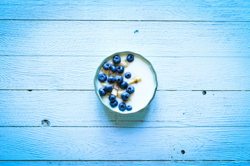 Obraz na płótnie Canvas Healthy Breakfast with blueberries and banana yogurt