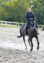 Girl riding a horse