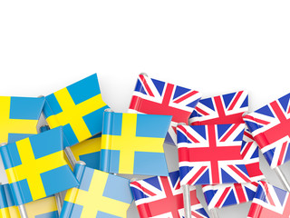 Flags of Sweden and UK isolated on white