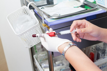 nurse prepare IV solution for patient
