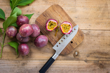 Fresh passion fruits on a wooden background