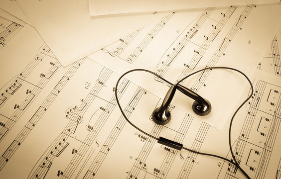 earphone on music sheet look like heart