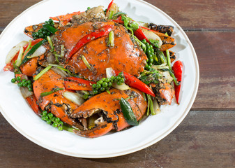 Stir fried crab with black pepper on white dish
