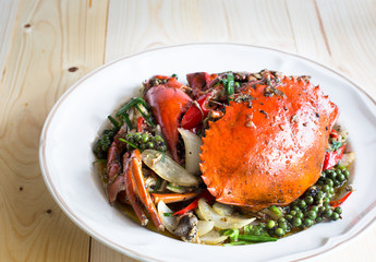 Stir fried crab with black pepper on white dish