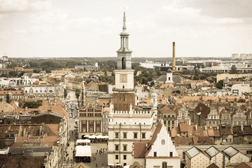 Poznan, Poland - June 28, 2016: Vintage photo, Town hall, old and modern buildings in polish city Poznan