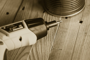 Hand Drill on Wood background, Home DIY Wokshop Concept.