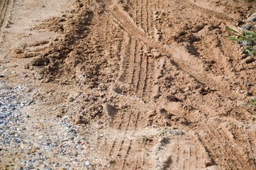 wheel tracks on dry soil