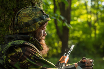 Young soldier with rifle