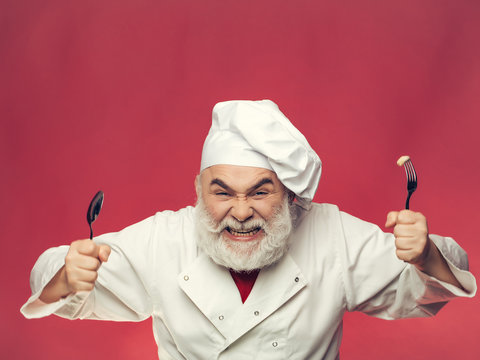 Bearded Cook With Spoon And Fork