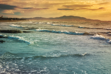 Sunrise on the beach and clouds