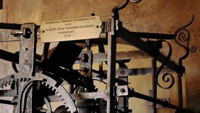 Ancient gear and clockwork in the clock tower of Mantua
