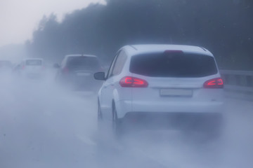 car traffic on highway in rain