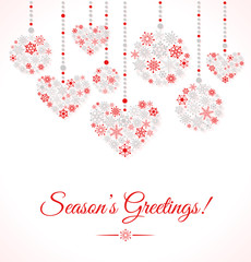 Greetings card with christmas ball made of snowflakes.