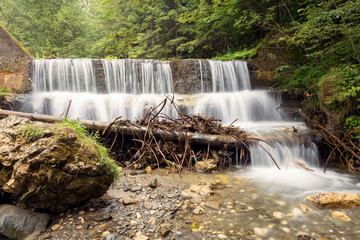 Mountain stream waterfall, in transylvanian mountains, Romania