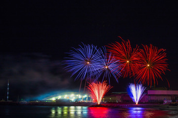 Beautiful fireworks in Genoa, Italy, with reflections on the sea