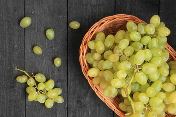 Grapes on wooden background