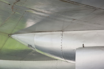 Aluminum fuselage and rivets on old airplane
