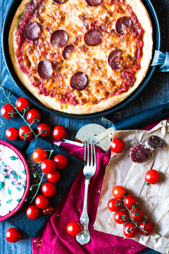 Tasty Hand Made Tomatoes and Pepperoni Pizza