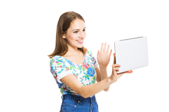 Funny Young Girl With A Tablet Isolated On White Background.