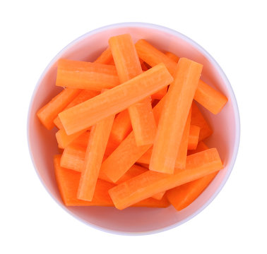 Top View Of Carrot Sticks In White Bowl Isolated On White