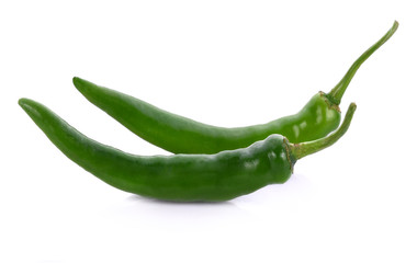 Green chilli pepper on white background