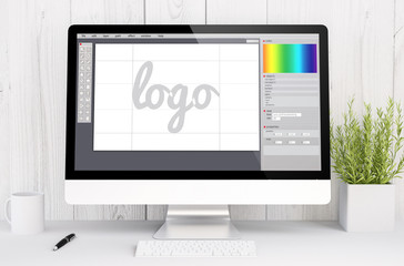 white workspace with computer  logo design