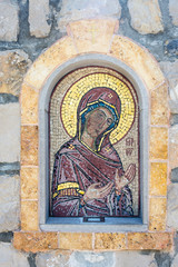 Old fresco mosaic on the entrance to the orthodox church