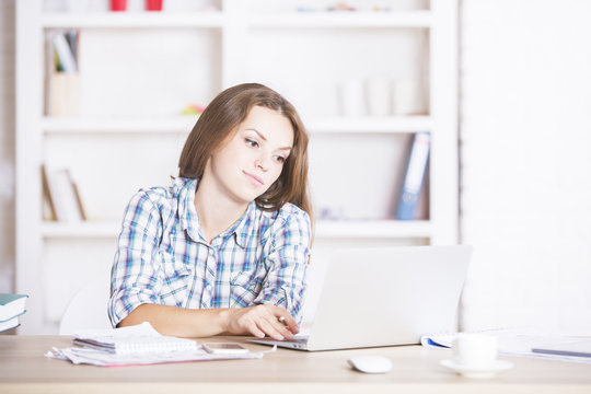 Young woman using laptop computer