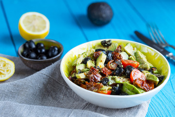 Fresh Tasty Salad with Avocado and Sun-Dried Tomatoes, Horizontal View