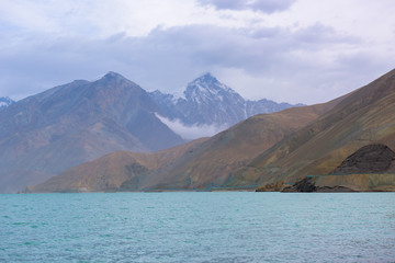 Fototapeta na wymiar Mount Muztag Ata, the father of ice mountains, and the Karakul Lake, on the Pamirs Plateau, Taxkorgan, Kashgar, Xinjiang, China
