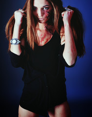 zombie girl with an ax. scars on the body with blood.