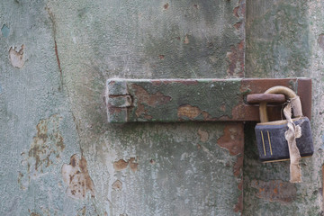 Old padlock on door