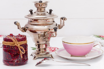 Samovar, strawberry jam and a cup of tea