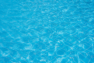 Swimming pool with sunny reflections