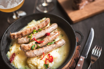 Delicious hearty meal with a glass of beer