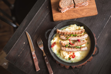 mashed potatoes with sausages