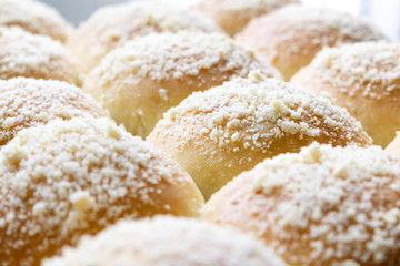 fresh hot sweet baked buns, close-up photo.