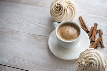 White cup of espresso coffee