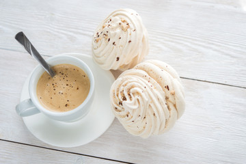 White cup of espresso coffee