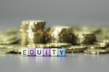 Equity text and gold coins