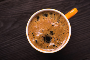 Orange cup of coffee