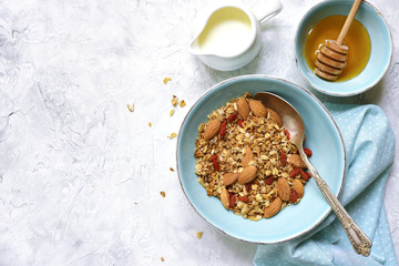 Homemade organic granola with almond and goji berries.Top view.