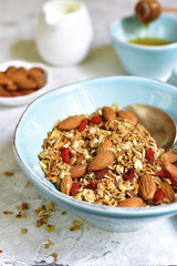 Homemade organic granola with almond and goji berries.