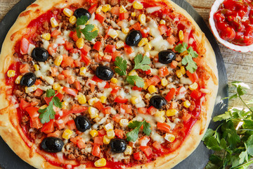 pizza with minced meat tomato cheese corn olives