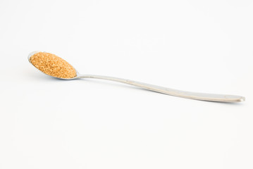 Brown sugar on  spoon